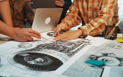 Engineers,Collaborate,And,Analyze,Detailed,Jet,Engine,Drawings,At,A